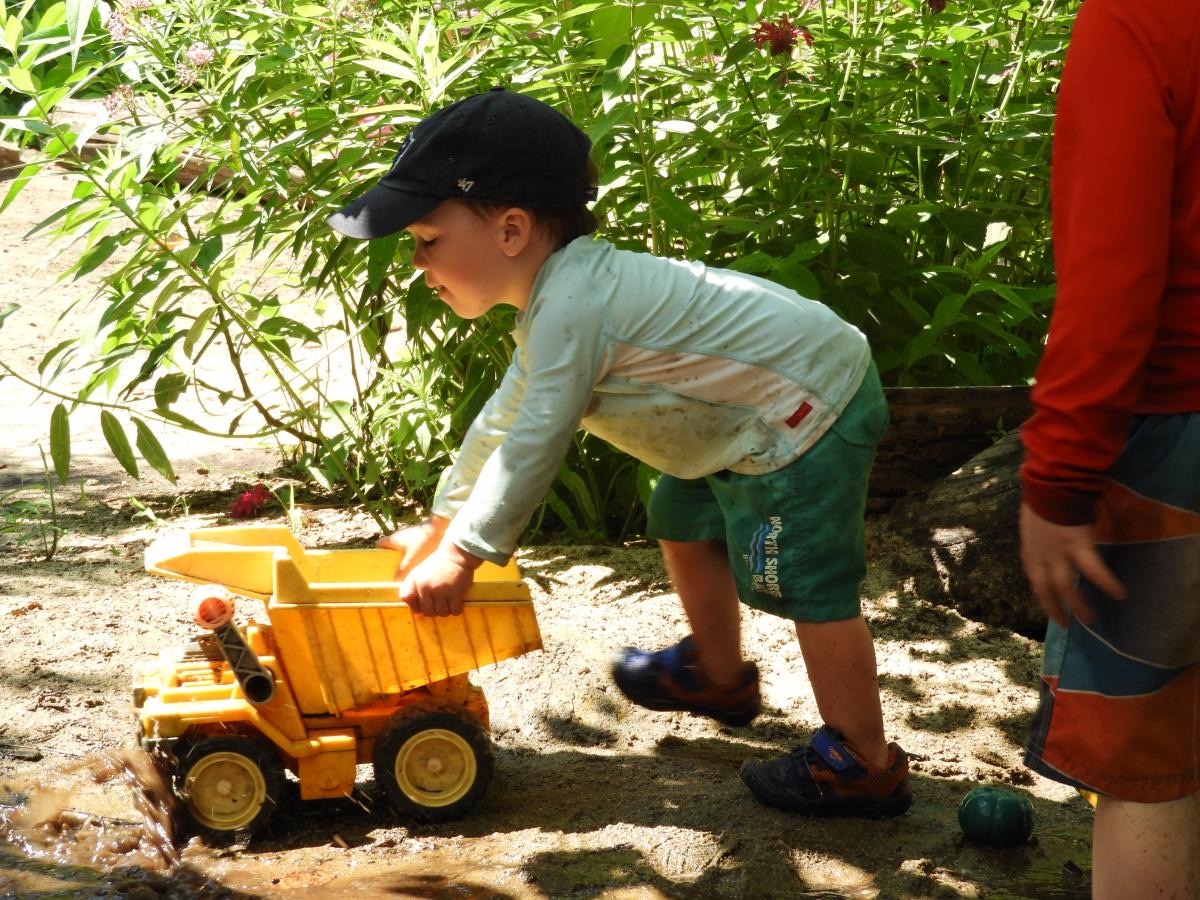 Toddlers playing together on the LPC playground